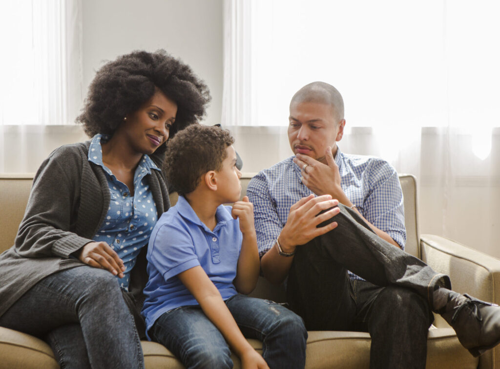 Parents talking to child about serious topic e1503003537530