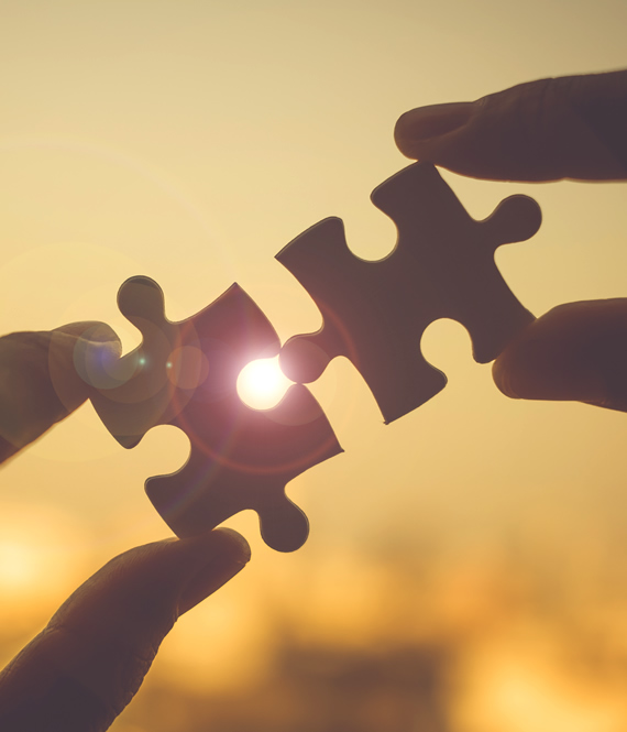 couple connecting a puzzle piece