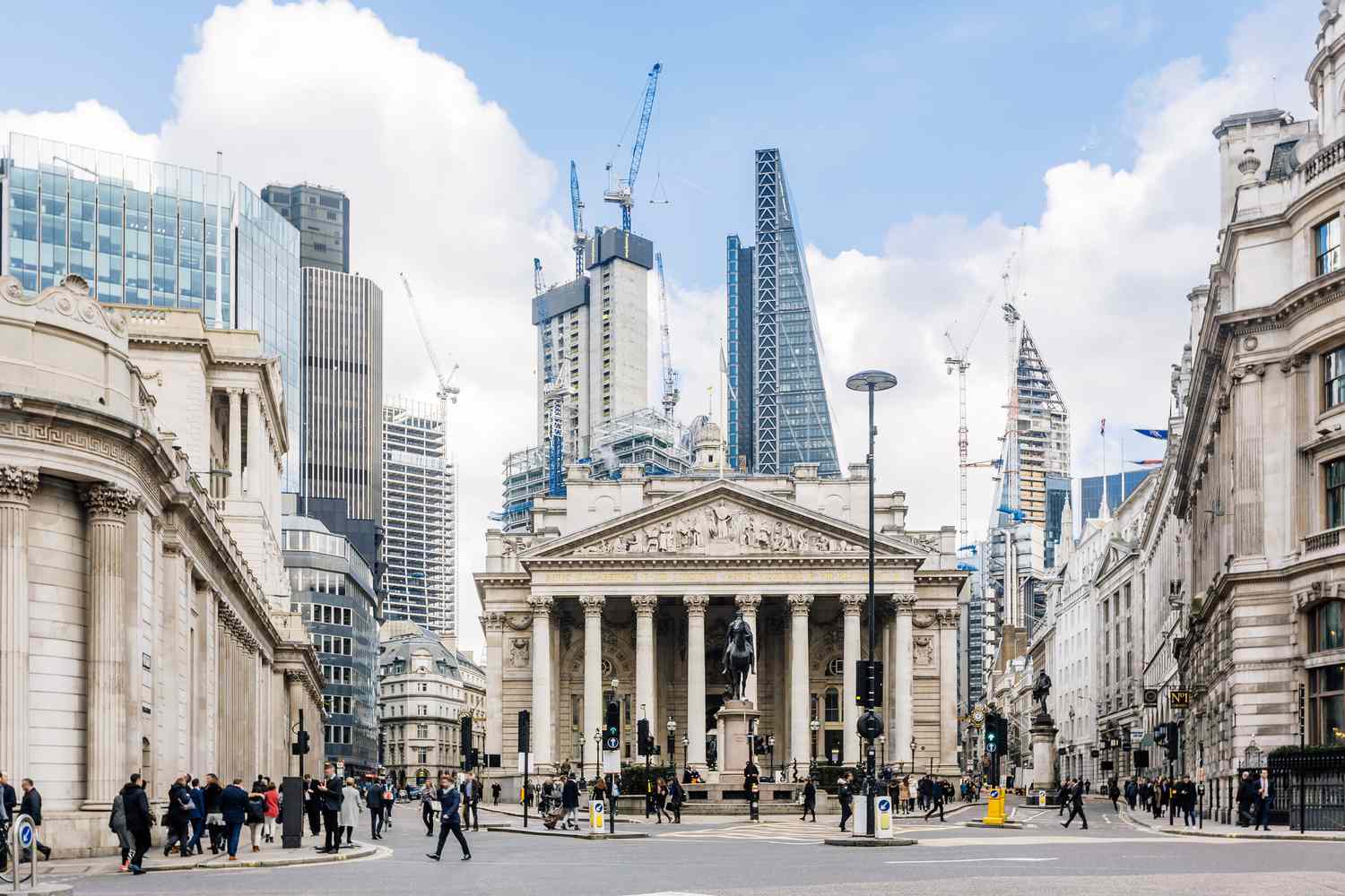 street in city of london with royal exchange bank of england and new modern skyscrapers england uk 923317900 cc8daffff0da44d38a6aacd70b8204cf